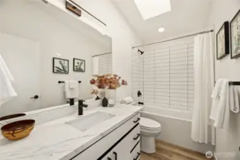 Large cabinet in bathroom for all of your essentials.