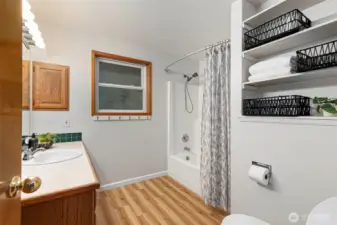 Upper full bathroom with storage closet