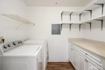 In-unit laundry lends convenience to this condo's check list. New paint, new floors and plenty of storage.