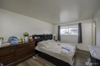 Unit 208 Primary Bedroom + Ensuite Bath