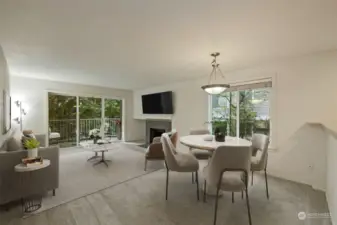 Virtually staged. Open floor plan with dining and living onto private balcony.