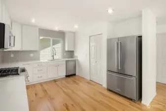 This kitchen comes equipped with stainless appliances.