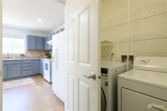 The walk in pantry/laundry is conveniently located off of the kitchen.