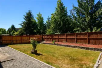 The fully fenced backyard provides a private and secure outdoor oasis, perfect for relaxing and entertaining. The well-maintained fencing ensures privacy while still allowing you to take advantage of the beautiful surroundings.