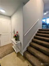 Entry few stairs to living room and kitchen.