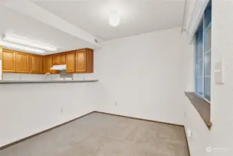 Dining room looking into kitchen.