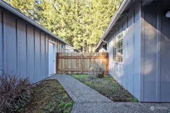 Backside of garage opens into private courtyard.