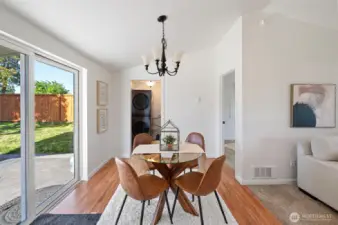 Well sized dining area - oversized slider connects inside to out.