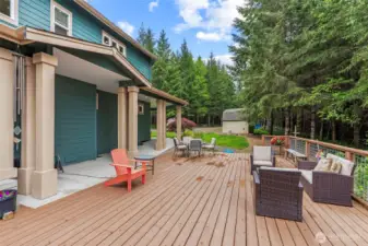 Beautiful Entertainers Deck viewing down the driveway and pump house with extra storage