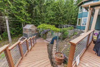 Deck leading out 7x8 green house and grounds