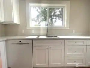 The view is lovely from the kitchen as you will see. Clean those dishes good with a Bosch brand dishwasher!