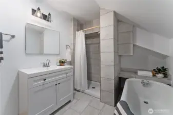 Upstairs bathroom with claw foot tun and rain shower!