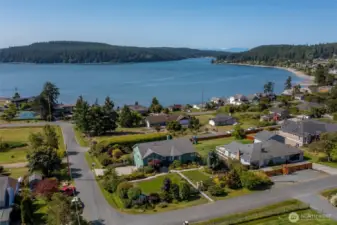 Deeded access to the beach located at the end of Washington Street is included.
