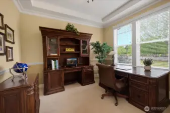 First floor den situated to see all of the comings and goings around you.