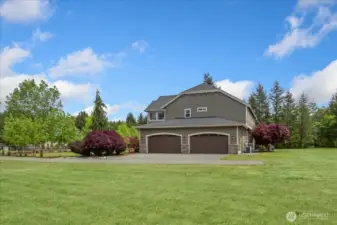 Home is an "end loader" garage which provides nice wide presence and WOW curb appeal
