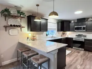 Inviting kitchen with granite countertops