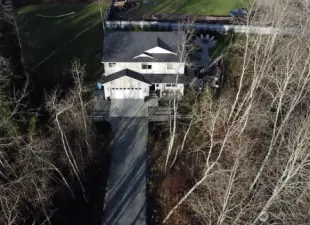 Beautiful seasonal foliage in the wetlands area at the front of the property creates a wonderful privacy buffer and is a sanctuary for birds.
