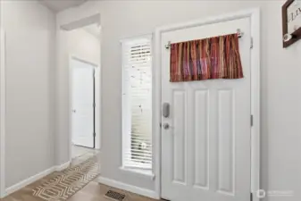 Entryway looking towards 1/2 bath