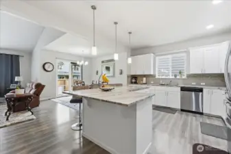 Great room features Gourmet Kitchen open to dining area and family room