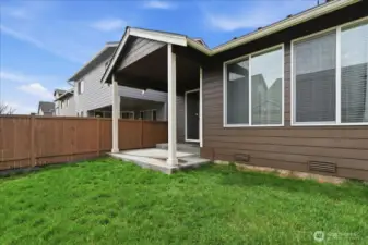 Covered patio for outdoor BBQs even should it rain.
