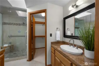 Separate vanity area and walk-in closet add function to the spacious primary suite.
