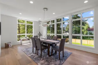 Oh I just love this entertaining size dining area with tons of beautiful windows, light and tall ceilings