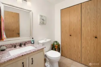 Main Level Half Bath With Space for Full Sized Washer and Dryer in Closet