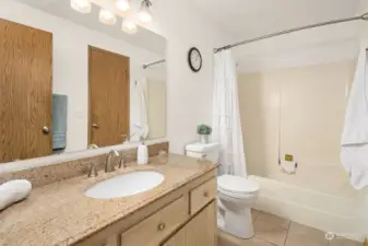 Full Bath off of Primary Bedroom is Continental Style, With Hallway and Bedroom Access