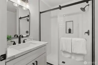 This stunning main floor 3/4 bathroom will WOW guests (and is located next to the main floor guest bedroom)