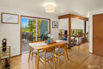 Dining area surrounded by windows.