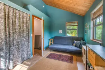 The vaulted ceilings add even more light making this a perfect guest space or office.