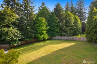 Another angle of the back yard that show fully fenced and private.