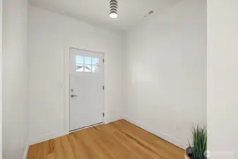 There is a spacious entry inside and the entire home is luxury vinyl tile flooring.