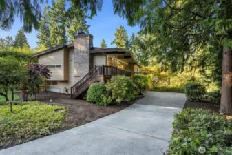Long driveway creates privacy from the street, and offers extra space for guest parking or a small boat/RV as well.