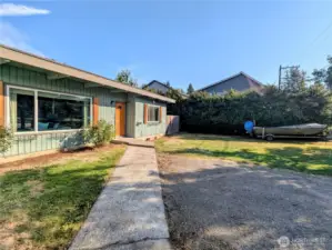 Paved walkway entrance to home