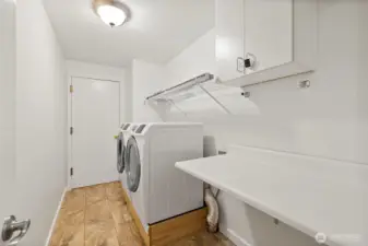Laundry leading to 2 car garage