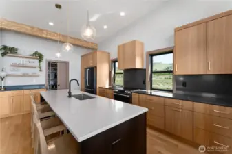 arge chef's kitchen with  walk in pantry! Pantry has custom built storage!