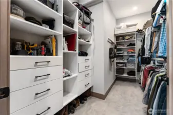 Primary walk-in Closet with custom built in storage!