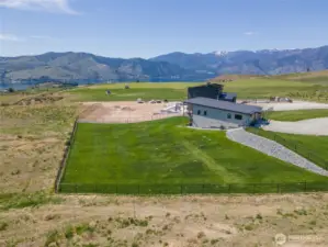 Partially fenced yard with sprinkler system!