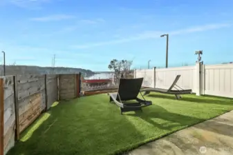 Patio door off flex room leads to the rear yard.