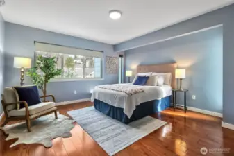 A bedroom on this 2nd level has a spacious walk-in closet with organizer.