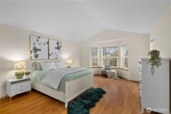 A spacious primary retreat designed for true relaxation, with room to unwind, recharge, and start each day refreshed.