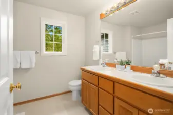 The upper-level full main bath serves the other secondary bedrooms.