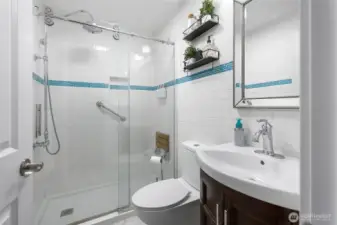 Tiled bathroom on the main floor.