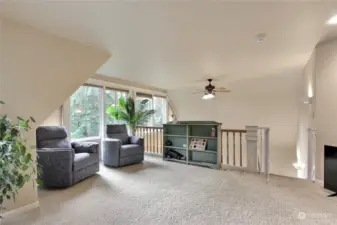 The loft is flooded with natural light. How will you use this space? Reading nook? Play area?