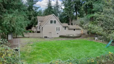 Oversized fully fenced yard with dog run will give you all the space you could need. Lot goes way beyond the fence line shown in next picture.