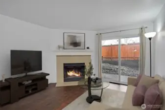 A simple and elegant fireplace brings warmth and ambiance to the room.