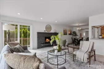 Spacious living and dining room, along with kitchen have easy access to the large wrap around deck.
