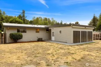 Beside the blank canvas this large lot offers, there is additional storage behind the bonus room.