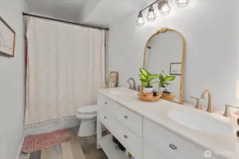 Tastefully updated lower-level full bathroom.